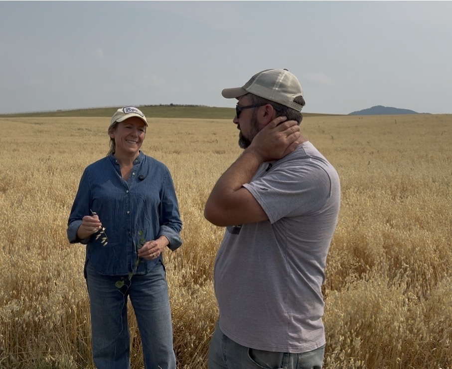 Jody Manuel and Colleen Kavanagh in oat field